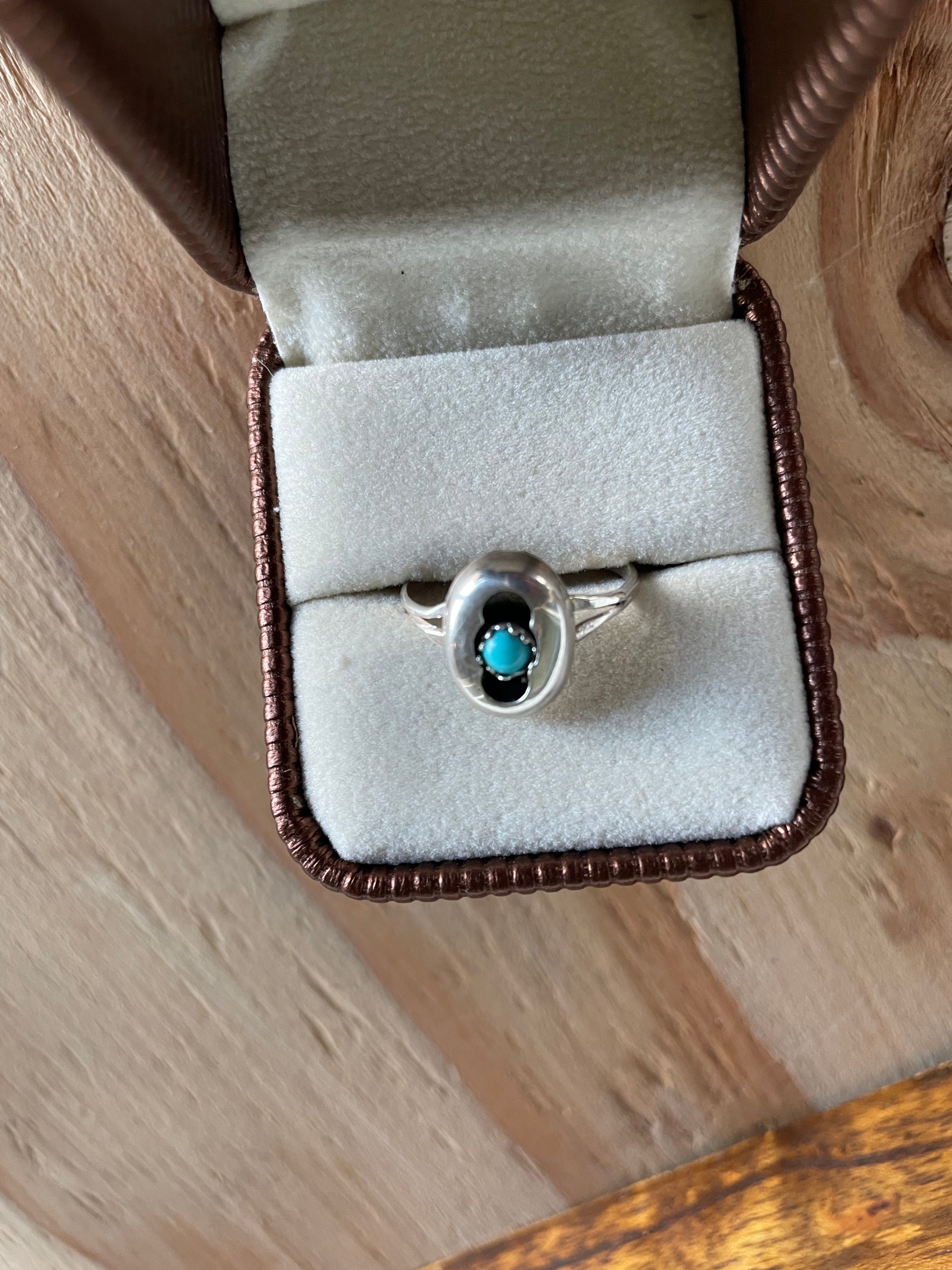 Turquoise Stone inside Silver Ring