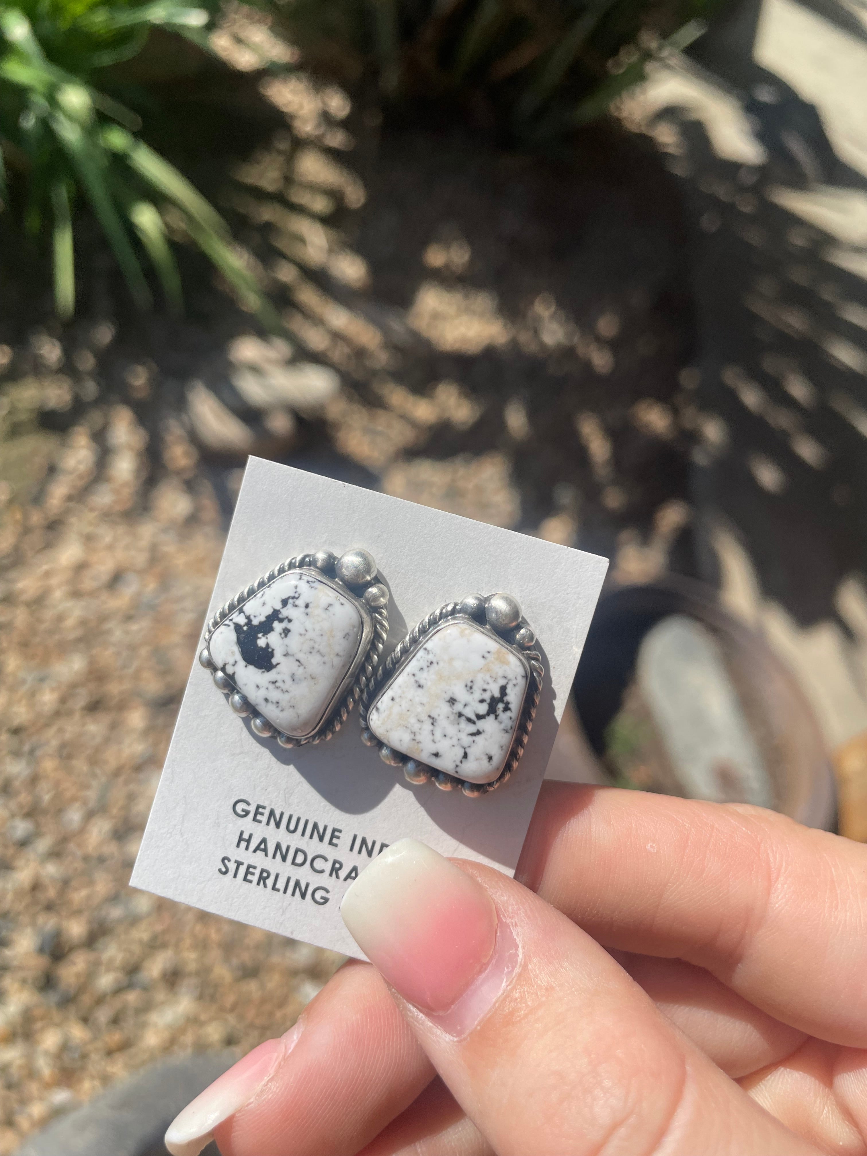 White Buffalo Studs with Silver Embellishments